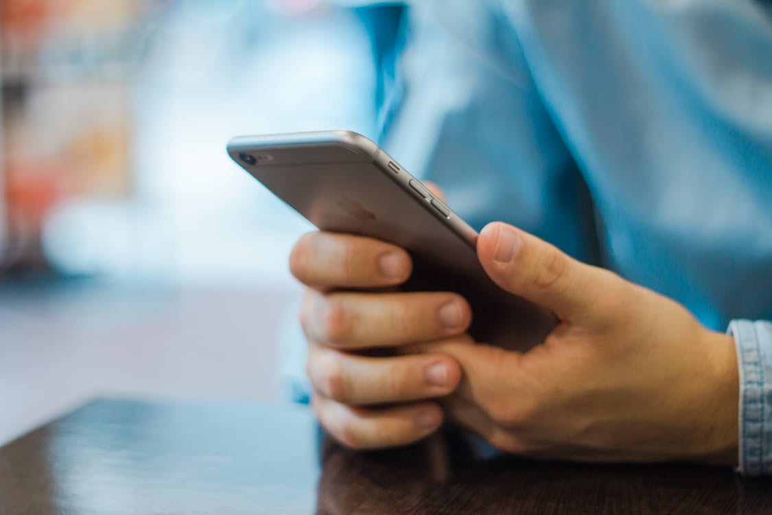 Man holding an iPhone